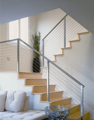 
After: The recycled-content stainless-steel stair railing made a big aethetic impact, Michelle says. Many of the home's design elements hadn't been touched since the 1980s.
